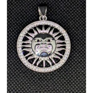 Bold Silver Plated, Iced Out Sun Face Pendant With CZ Stones In The Medallion